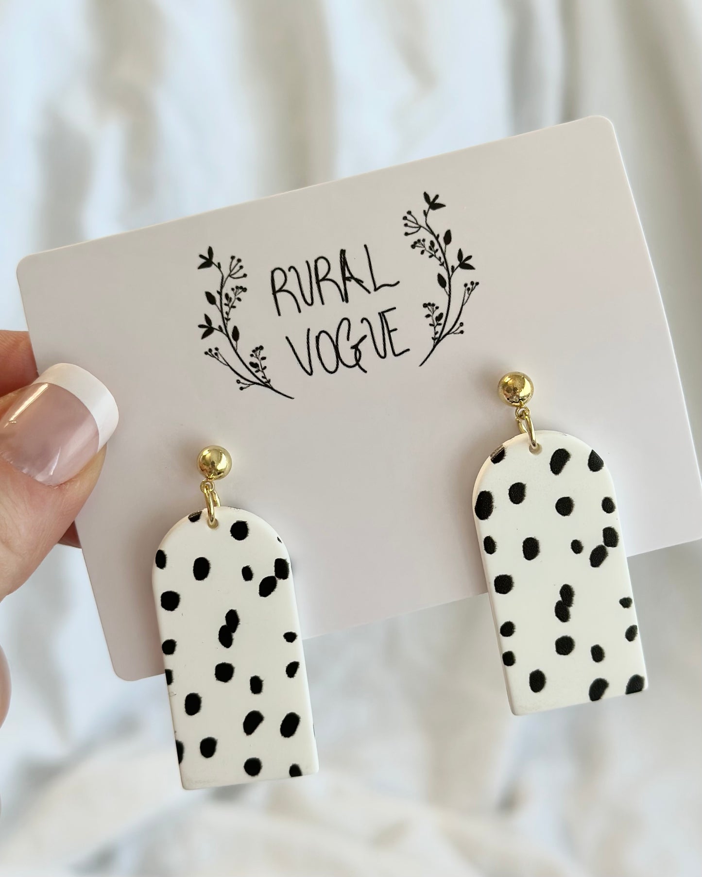 Arched Black Spot Dangle Earrings